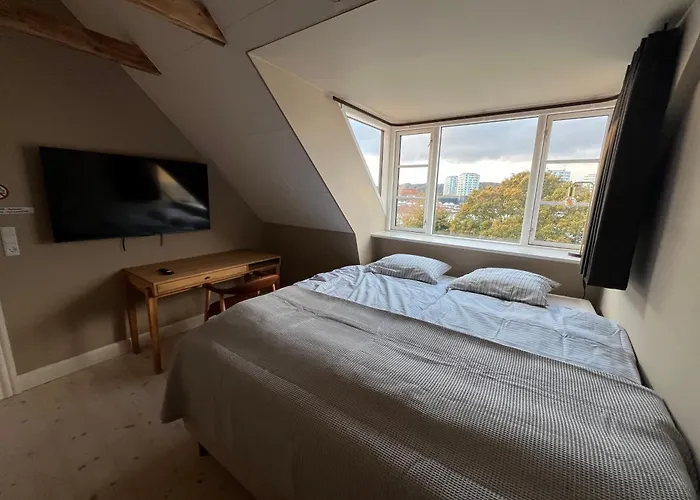 Byhuset Lägenhetshotell