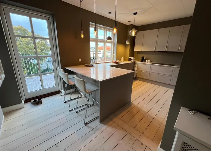 Aparthotel Byhuset *